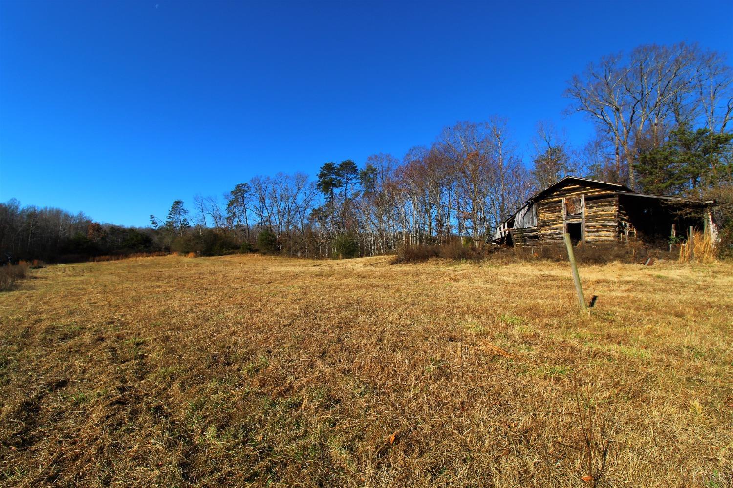 5134 Whispering Pines Road Cascade, VA 24069 - Photo 25 of 45 a view of a yard with a house in the background