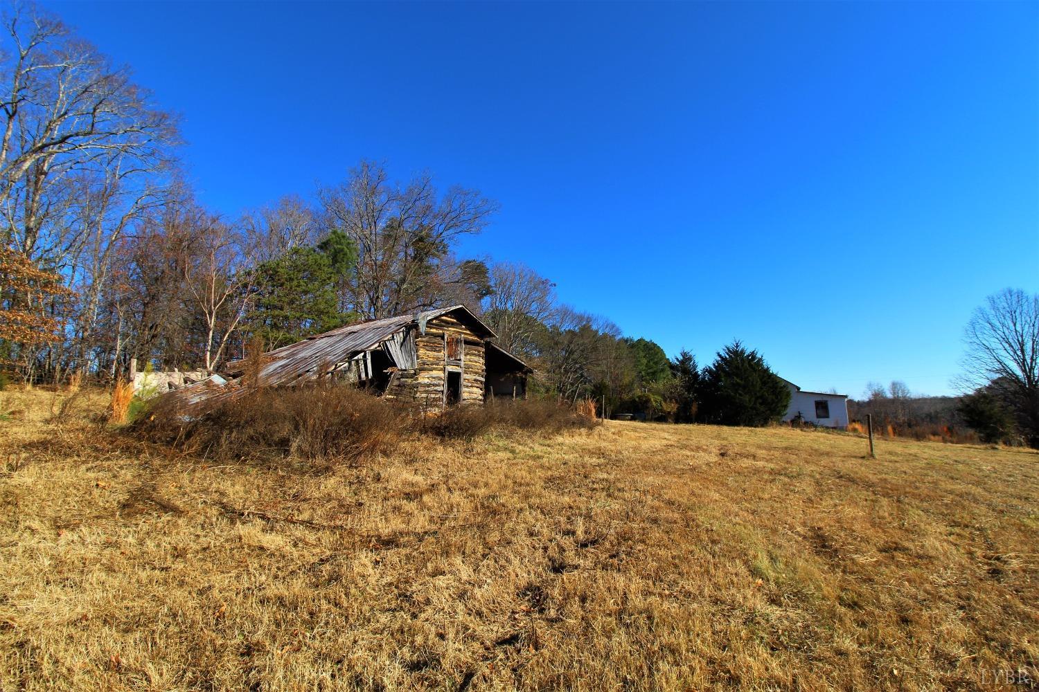 5134 Whispering Pines Road Cascade, VA 24069 - Photo 26 of 45 a front view of a house with a yard