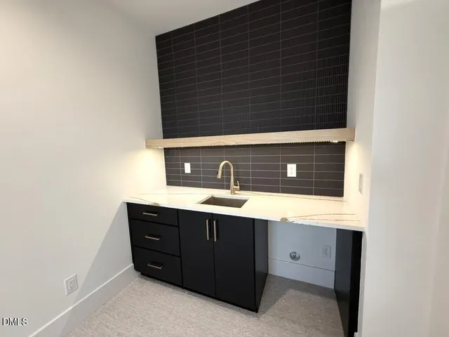 a view of an empty room with a balcony