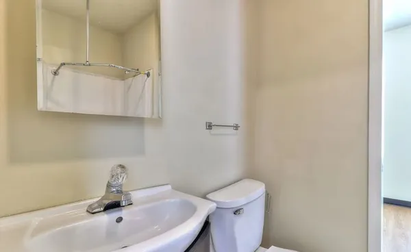 a bathroom with a sink and a toilet