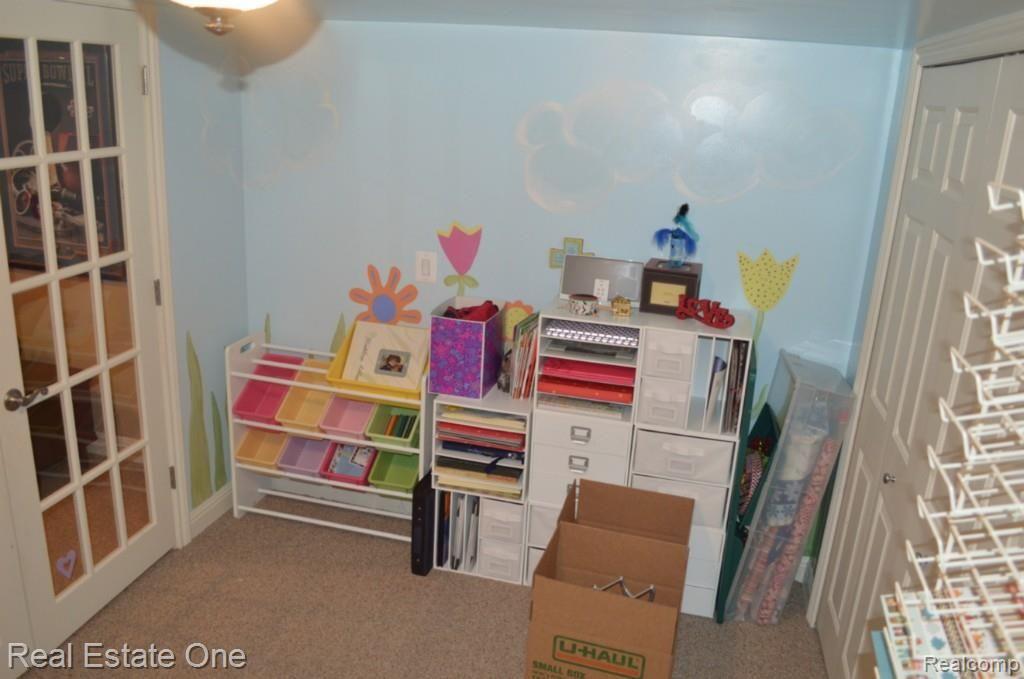 48005 Gladstone Road Canton, MI 48188 - Photo 60 of 62 Basement craft room, possible office or play space