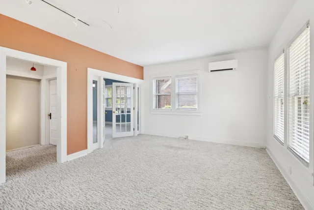 an empty room with windows