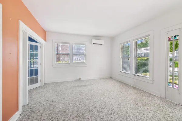 an empty room with windows