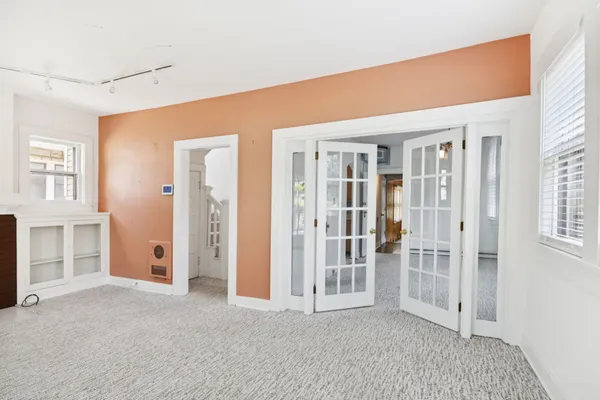 an empty room with windows