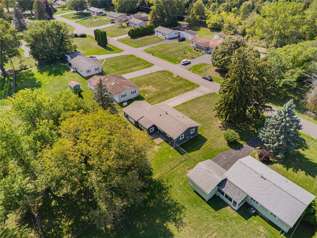 88 Rouge Road Henrietta, NY 14623 - Photo 3 of 24 There’s another outdoor space off the patio room-