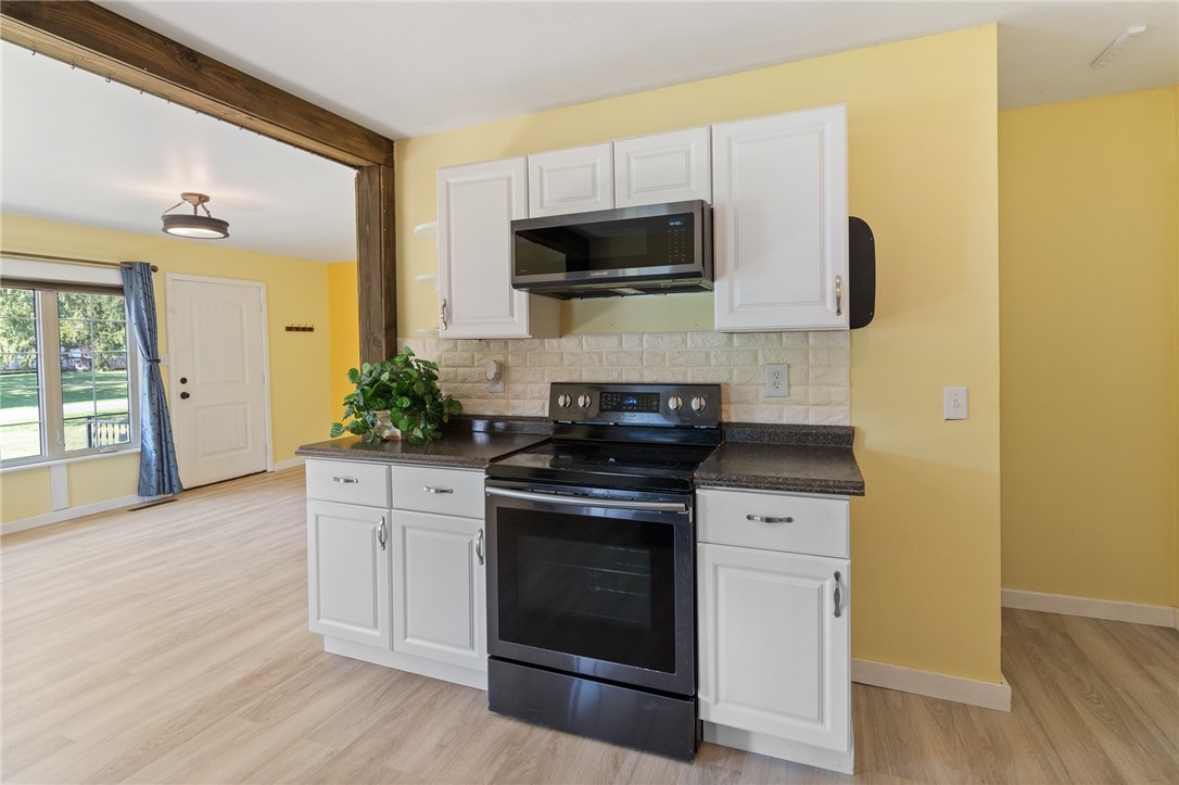 88 Rouge Road Henrietta, NY 14623 - Photo 6 of 24 The easy to clean WHITE CABINETRY makes this space