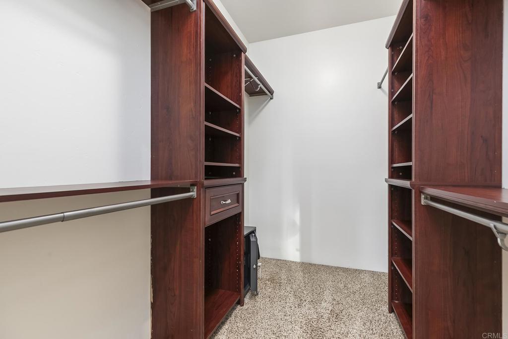 10546 Valle Vista Road Lakeside, CA 92040 - Photo 24 of 66 a view of walk in closet with clothes and shoes