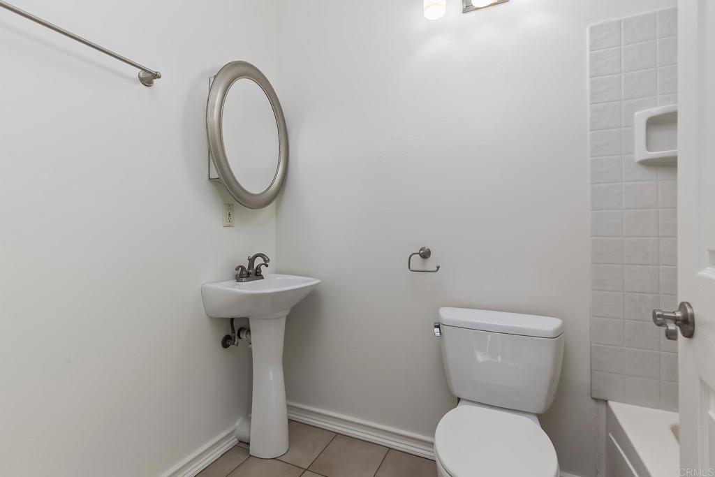 10546 Valle Vista Road Lakeside, CA 92040 - Photo 25 of 66 a bathroom with a toilet sink and a mirror