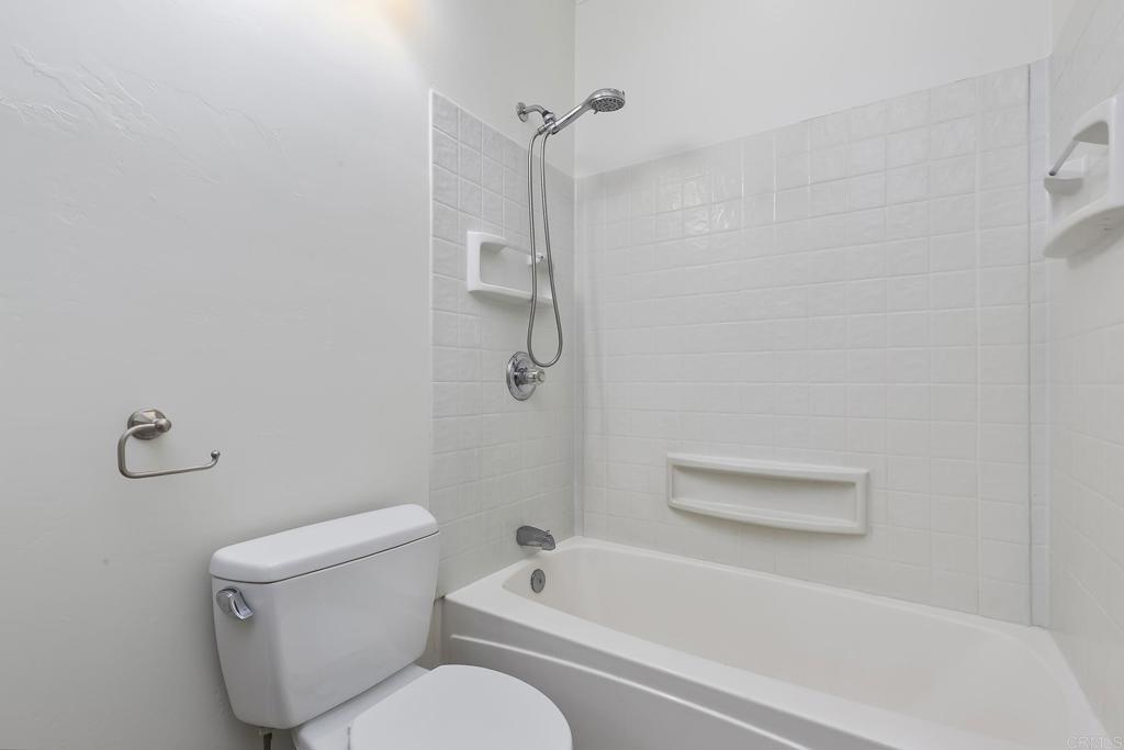 10546 Valle Vista Road Lakeside, CA 92040 - Photo 26 of 66 a bathroom with a toilet and a bathtub