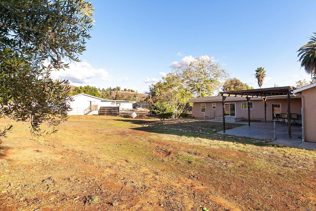 10546 Valle Vista Road Lakeside, CA 92040 - Photo 27 of 66 a view of a yard with a fountain