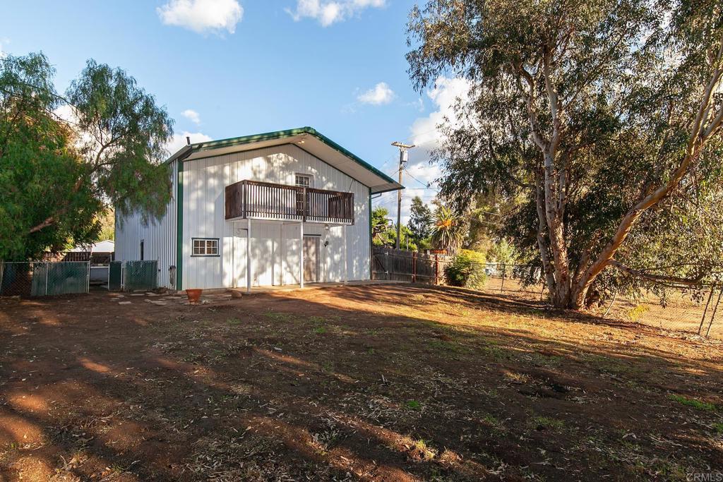10546 Valle Vista Road Lakeside, CA 92040 - Photo 58 of 66 a front view of a house with a yard
