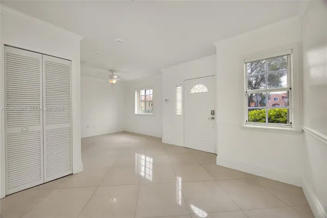 a bathroom with a toilet a sink and a mirror