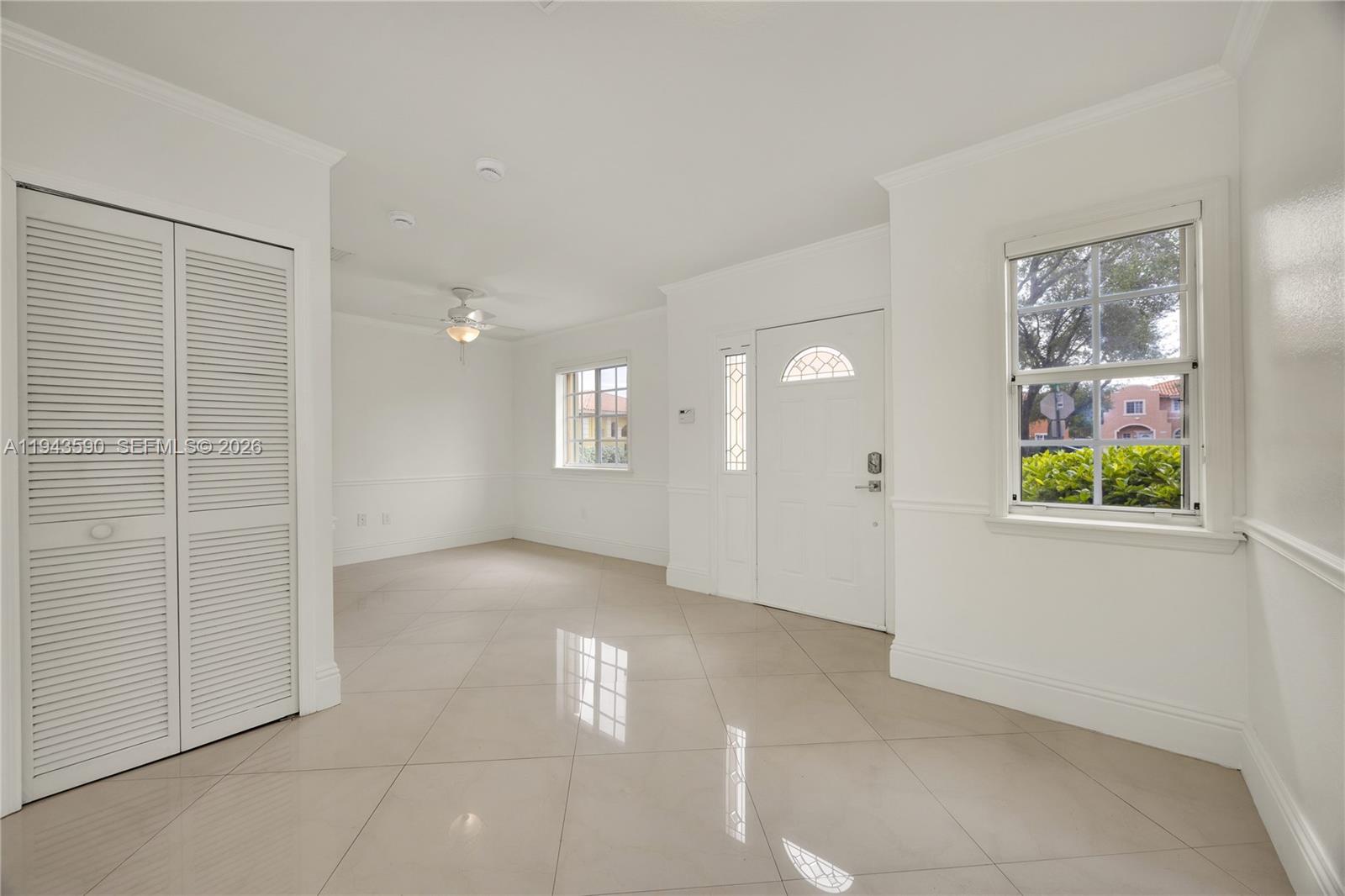 7773 Southwest 94th Lane Miami, FL 33156 - Photo 11 of 50 an empty room with windows and closet