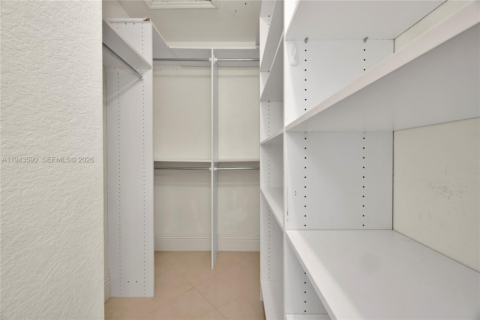 7773 Southwest 94th Lane Miami, FL 33156 - Photo 19 of 50 a view of an empty walk in closet