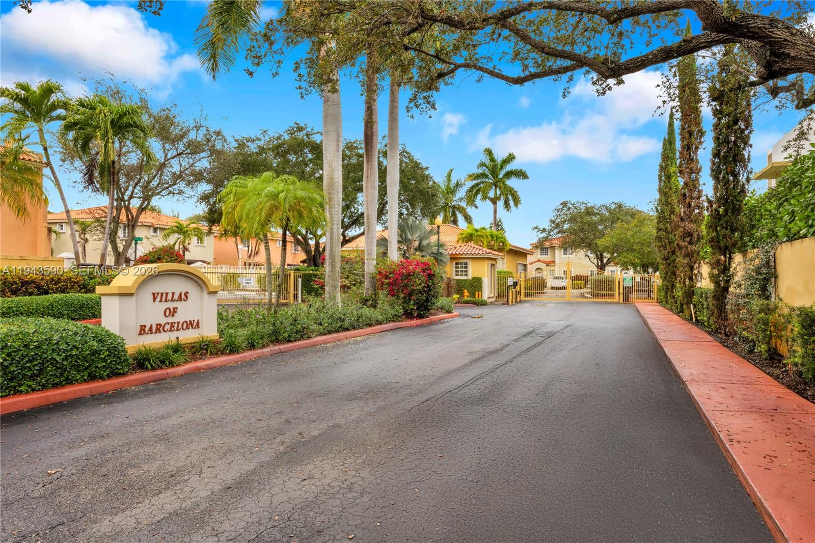 7773 Southwest 94th Lane Miami, FL 33156 - Photo 2 of 50 a view of a street with a palm tree