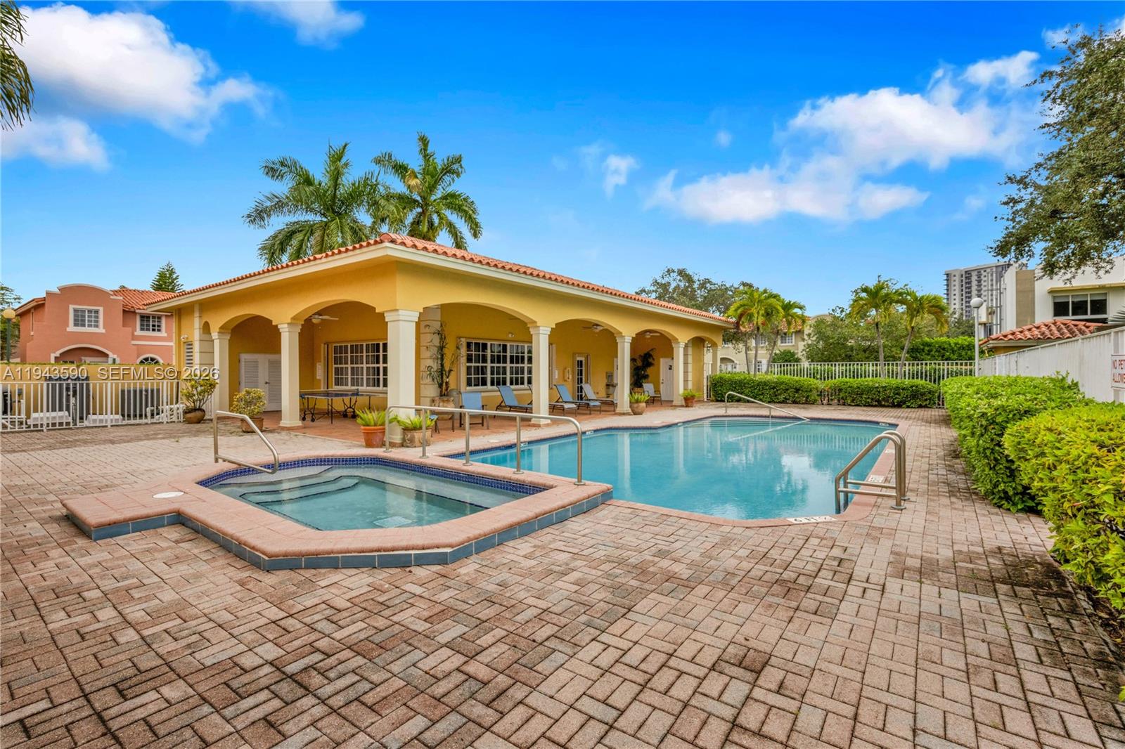 7773 Southwest 94th Lane Miami, FL 33156 - Photo 25 of 50 a front view of a house with swimming pool