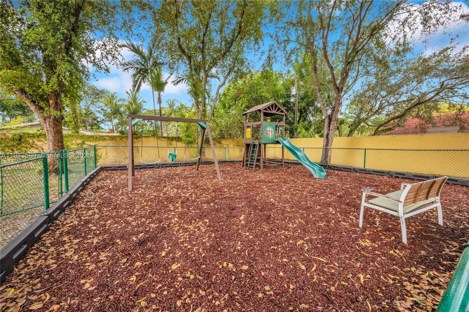 7773 Southwest 94th Lane Miami, FL 33156 - Photo 28 of 50 a view of a yard with a tree