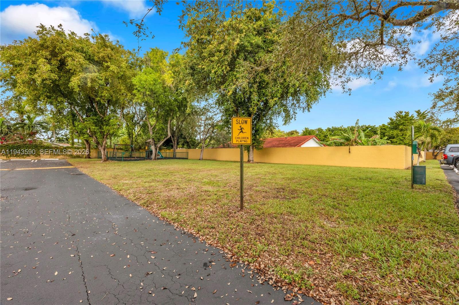 7773 Southwest 94th Lane Miami, FL 33156 - Photo 29 of 50 a view of a yard with a tree