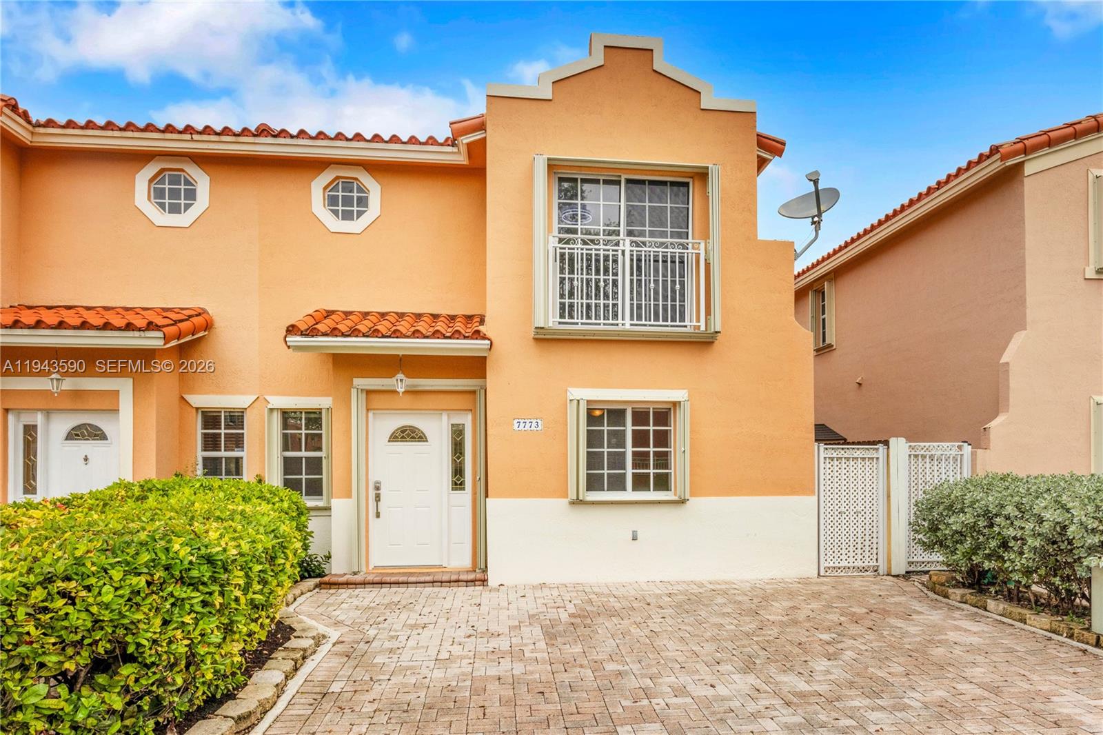 7773 Southwest 94th Lane Miami, FL 33156 - Photo 34 of 50 a front view of a house with a outdoor space