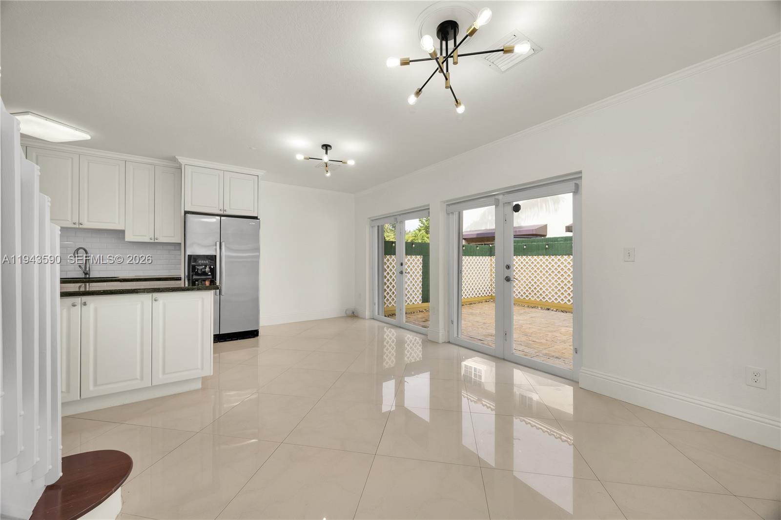 7773 Southwest 94th Lane Miami, FL 33156 - Photo 43 of 50 a view of a kitchen with a sink and cabinet