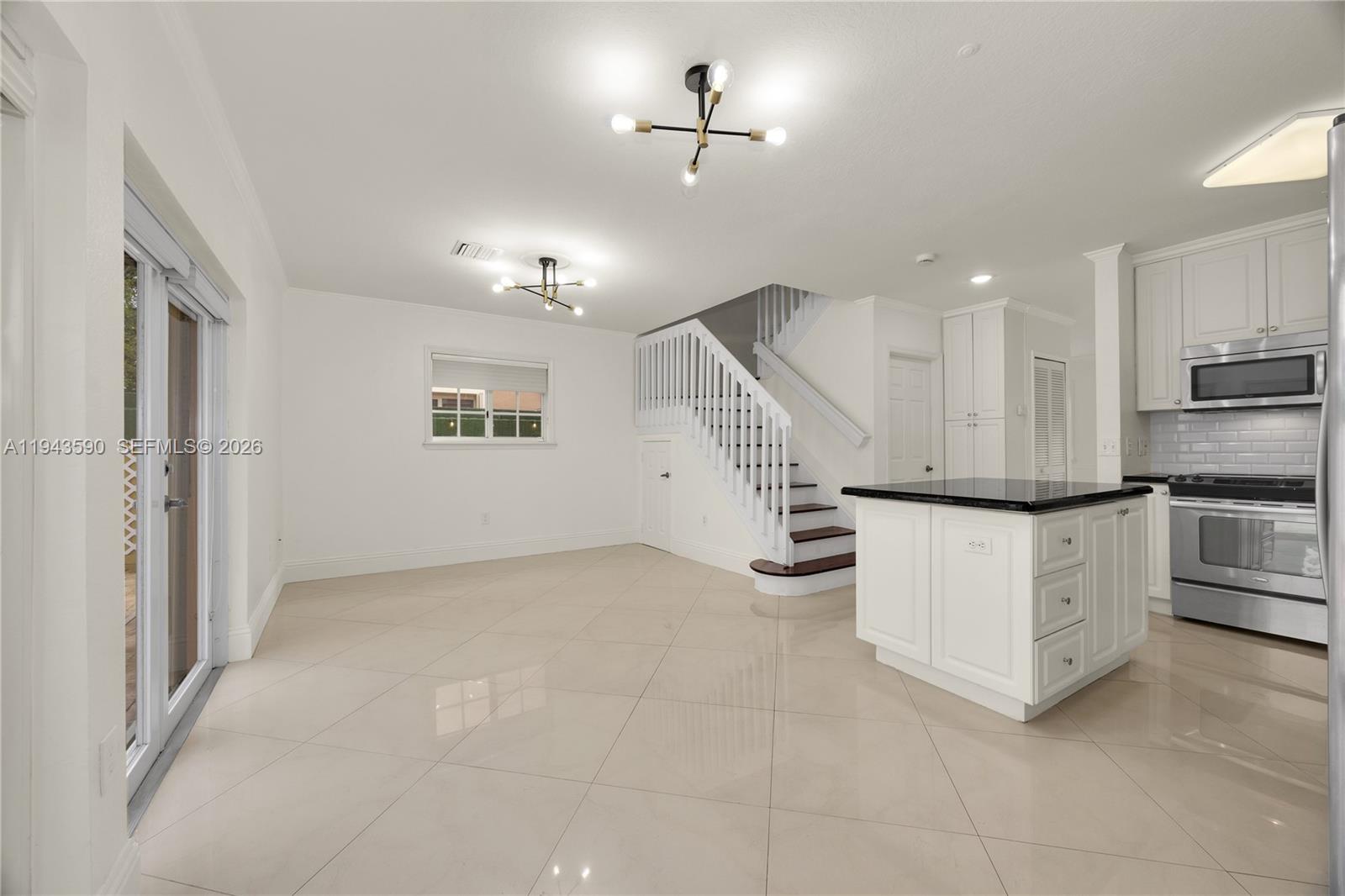 7773 Southwest 94th Lane Miami, FL 33156 - Photo 6 of 50 a view of kitchen with sink and cabinets