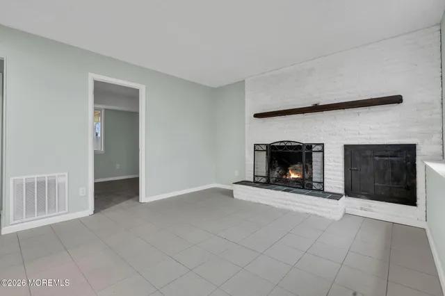 a bathroom with a toilet and a sink