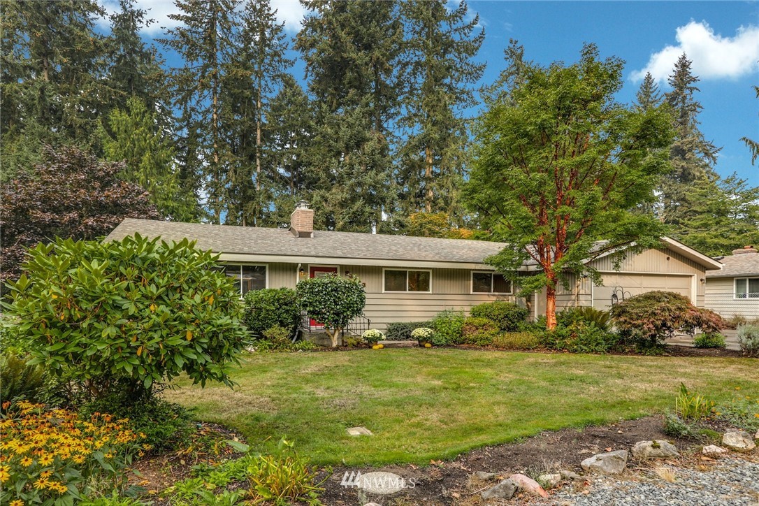 24106 4th Place West Bothell, WA 98021 - Photo 2 of 36 a front view of house with yard and green space