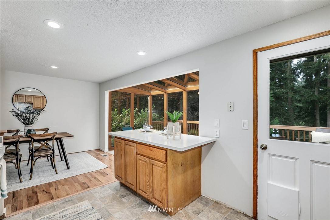 24106 4th Place West Bothell, WA 98021 - Photo 14 of 36 a view of a room that has a couch and a table in it