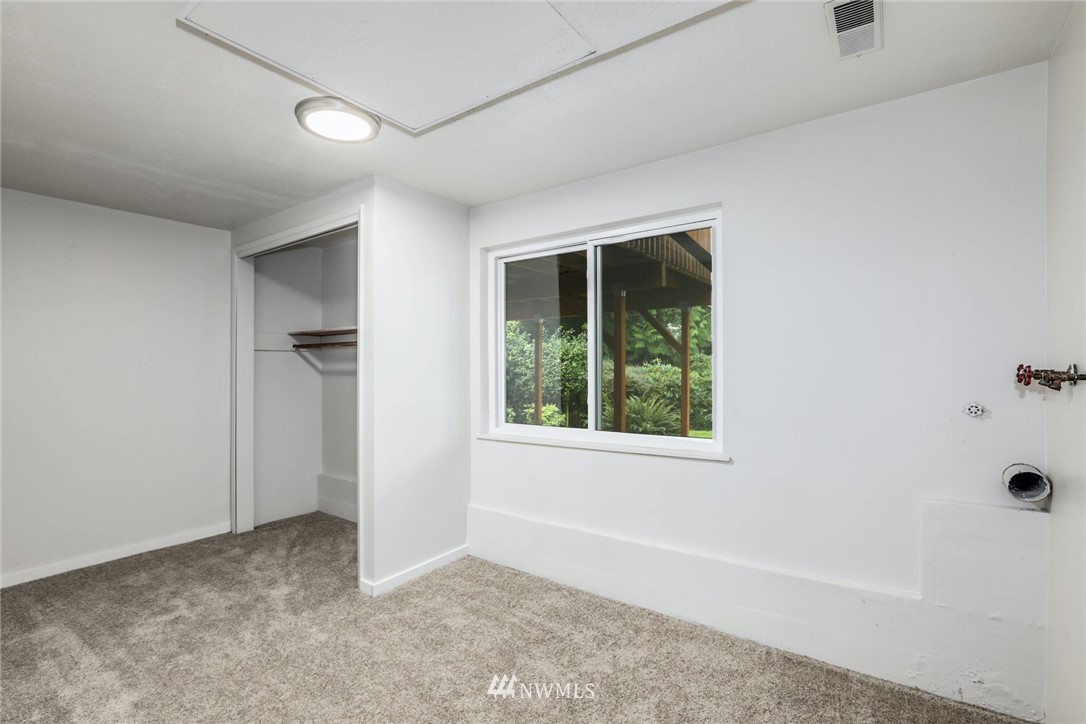 24106 4th Place West Bothell, WA 98021 - Photo 26 of 36 an empty room with windows and closet