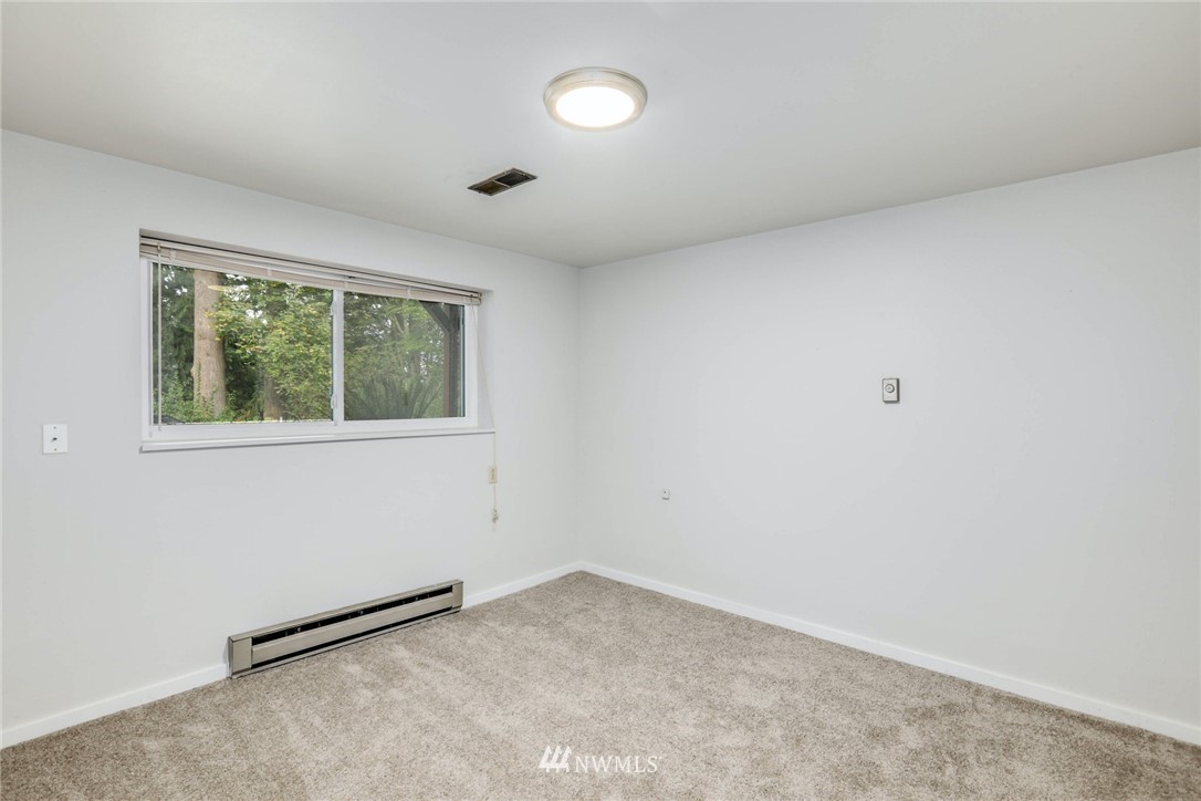 24106 4th Place West Bothell, WA 98021 - Photo 28 of 36 an empty room with a window