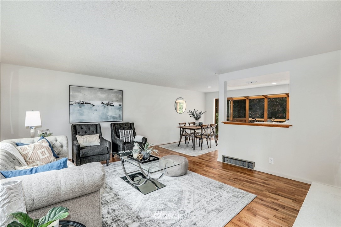 24106 4th Place West Bothell, WA 98021 - Photo 4 of 36 a living room with furniture and wooden floor