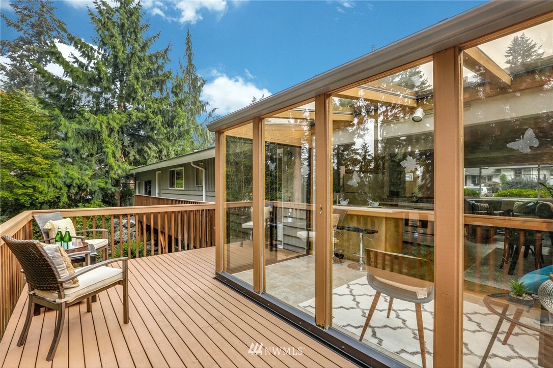 24106 4th Place West Bothell, WA 98021 - Photo 31 of 36 a view of balcony with furniture and wooden deck