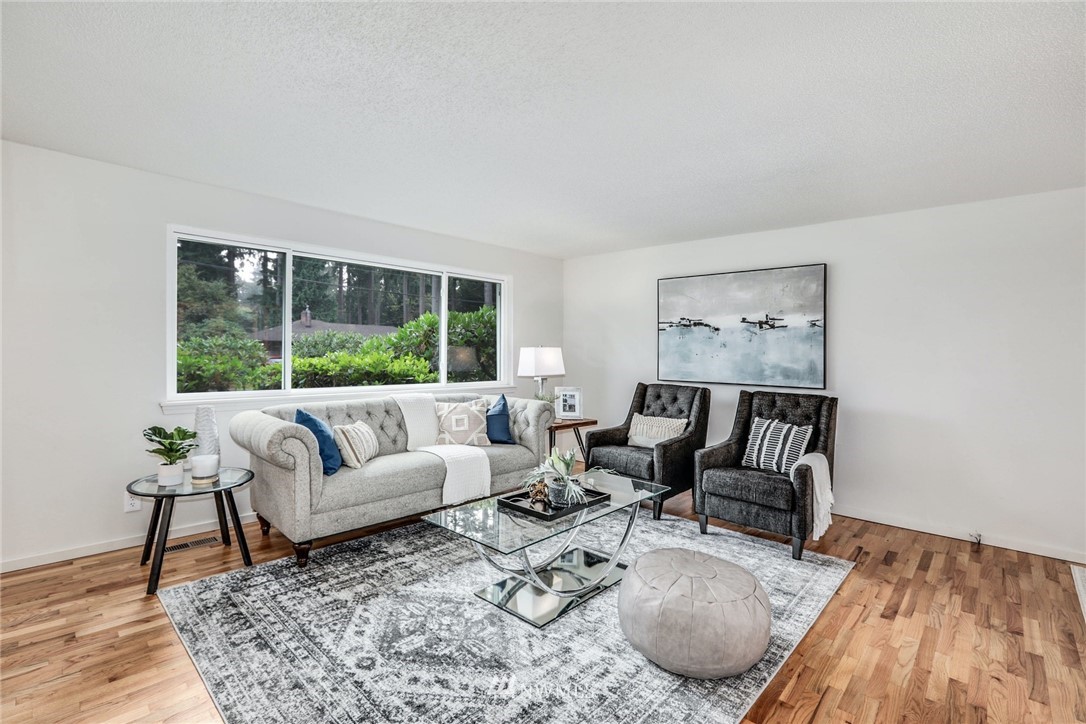 24106 4th Place West Bothell, WA 98021 - Photo 5 of 36 a living room with furniture and a large window