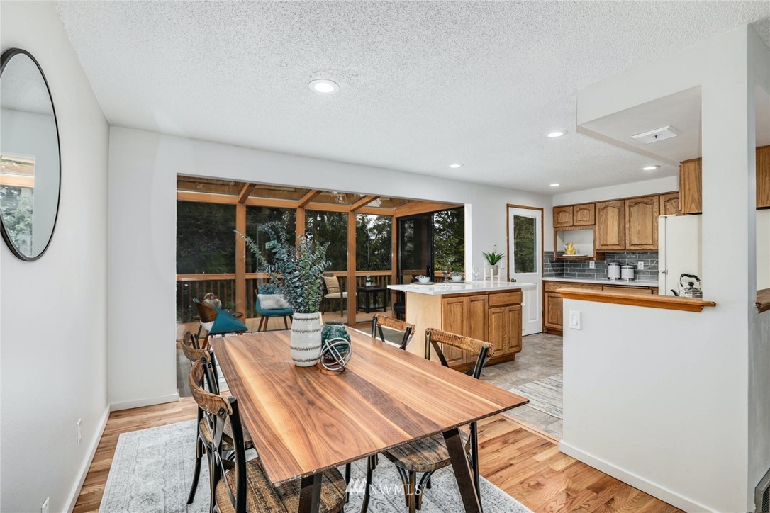 24106 4th Place West Bothell, WA 98021 - Photo 7 of 36 a view of a dining room with furniture window and outside view