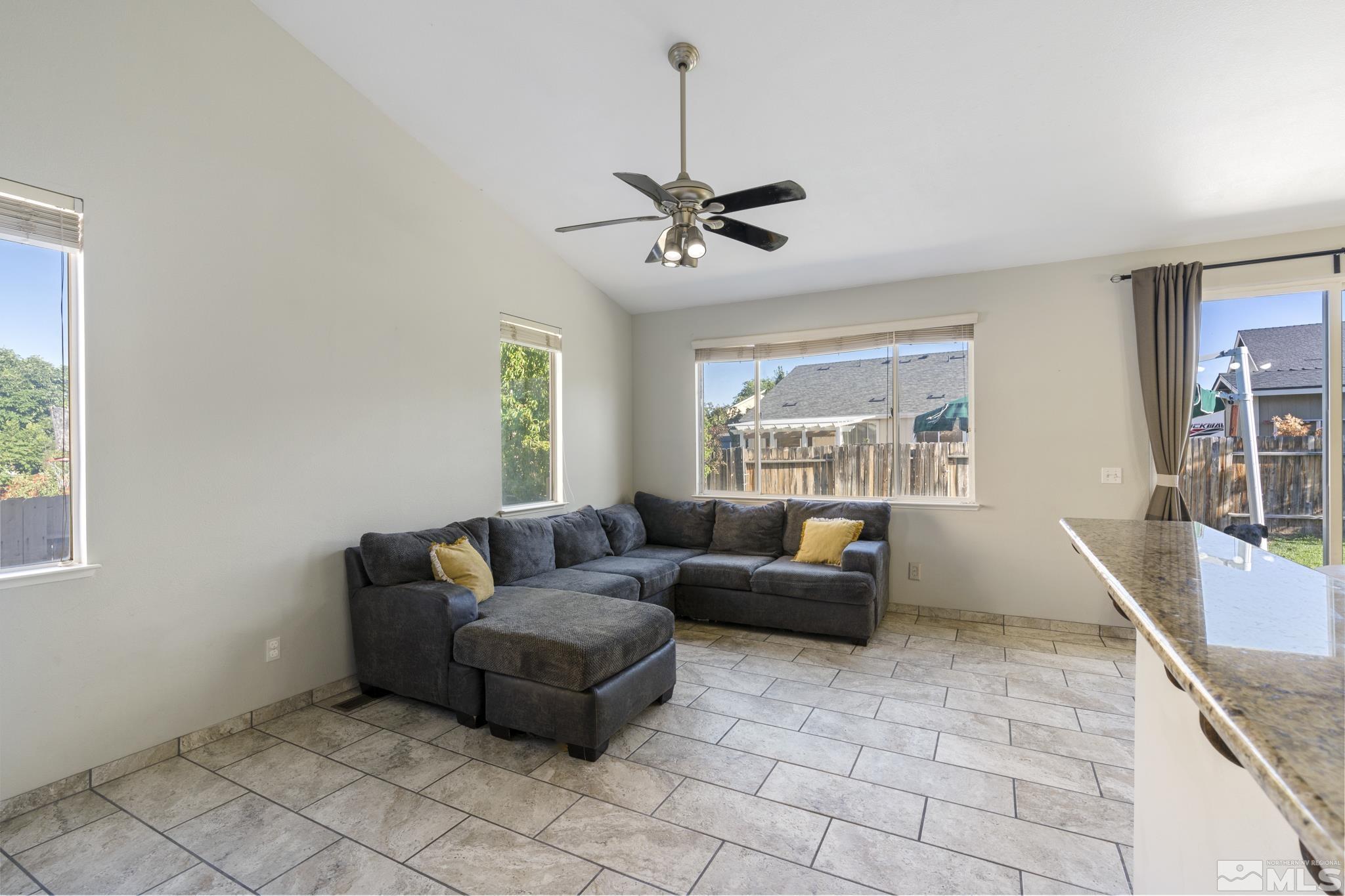 11760 Claim Stake Drive Reno, NV 89506 - Photo 6 of 22 a living room with furniture and a window