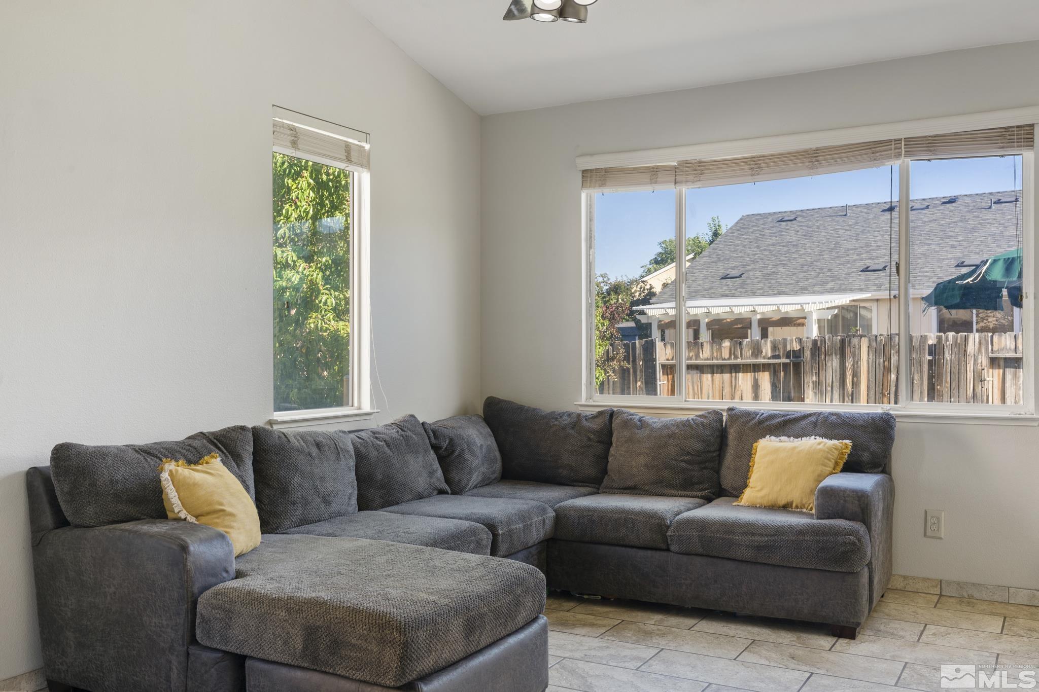 11760 Claim Stake Drive Reno, NV 89506 - Photo 7 of 22 a living room with furniture and a window