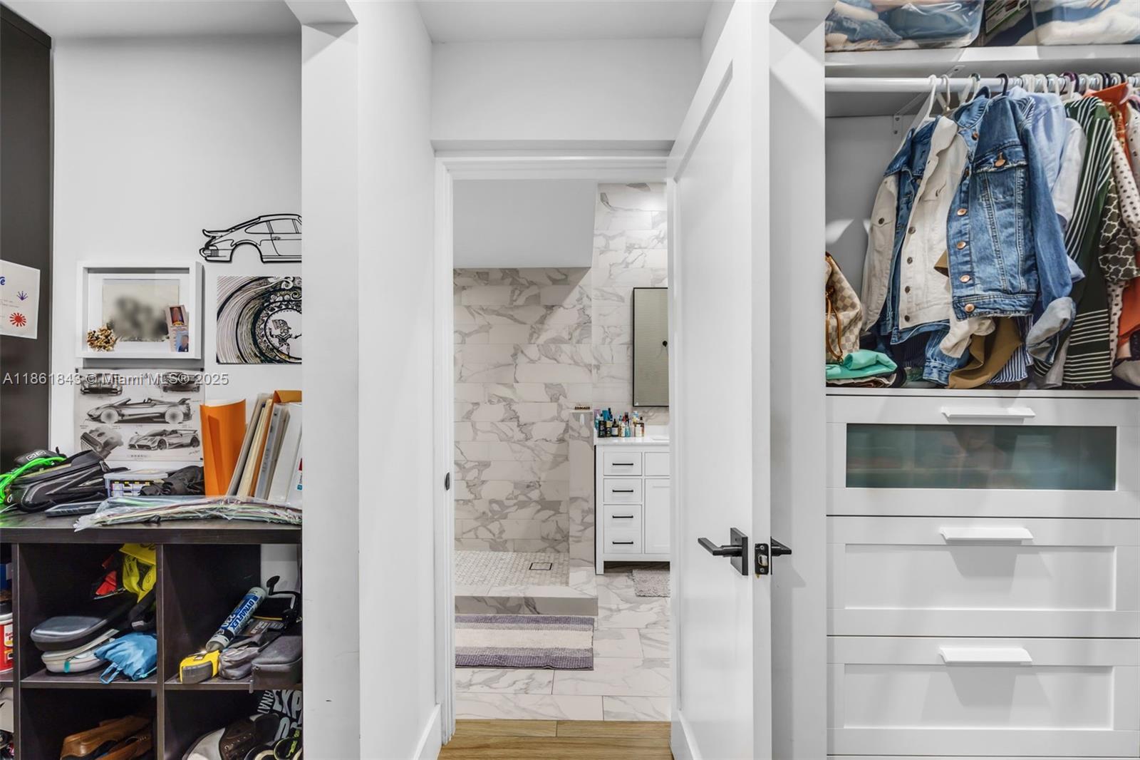 653 Glenridge Road Key Biscayne, FL 33149 - Photo 22 of 47 a view of walk in closet