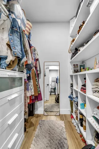 a bathroom with a double vanity sink mirror and