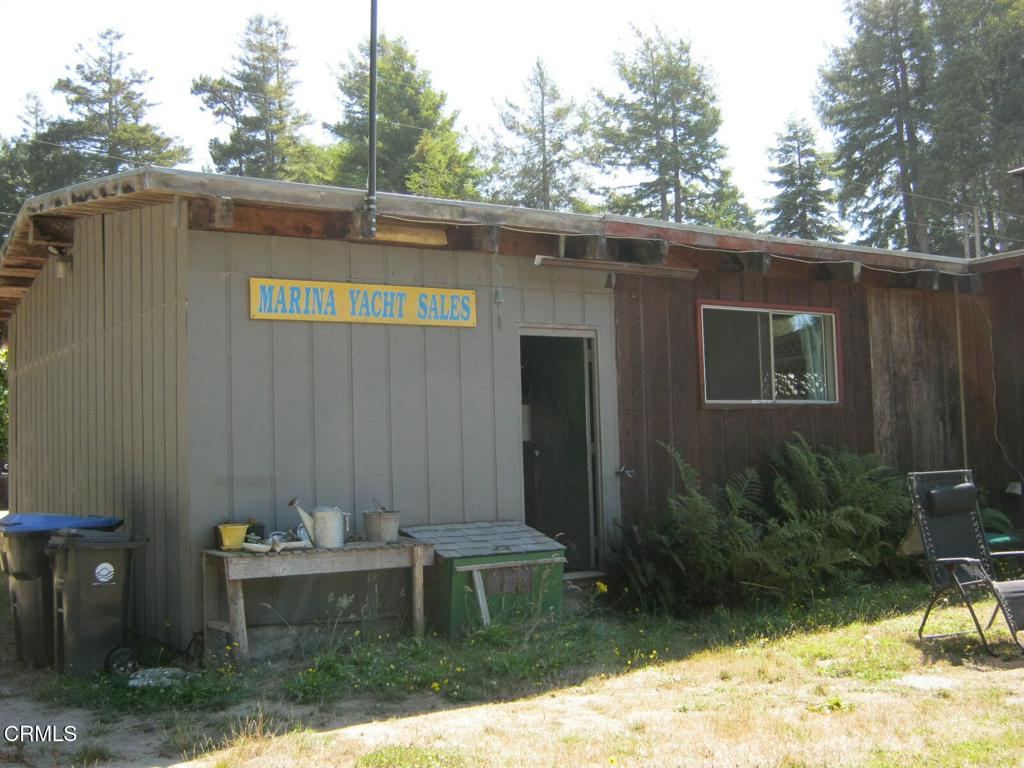 30520 Pudding Creek Road Fort Bragg, CA 95437 - Photo 3 of 24 a view of a backyard with table and chairs