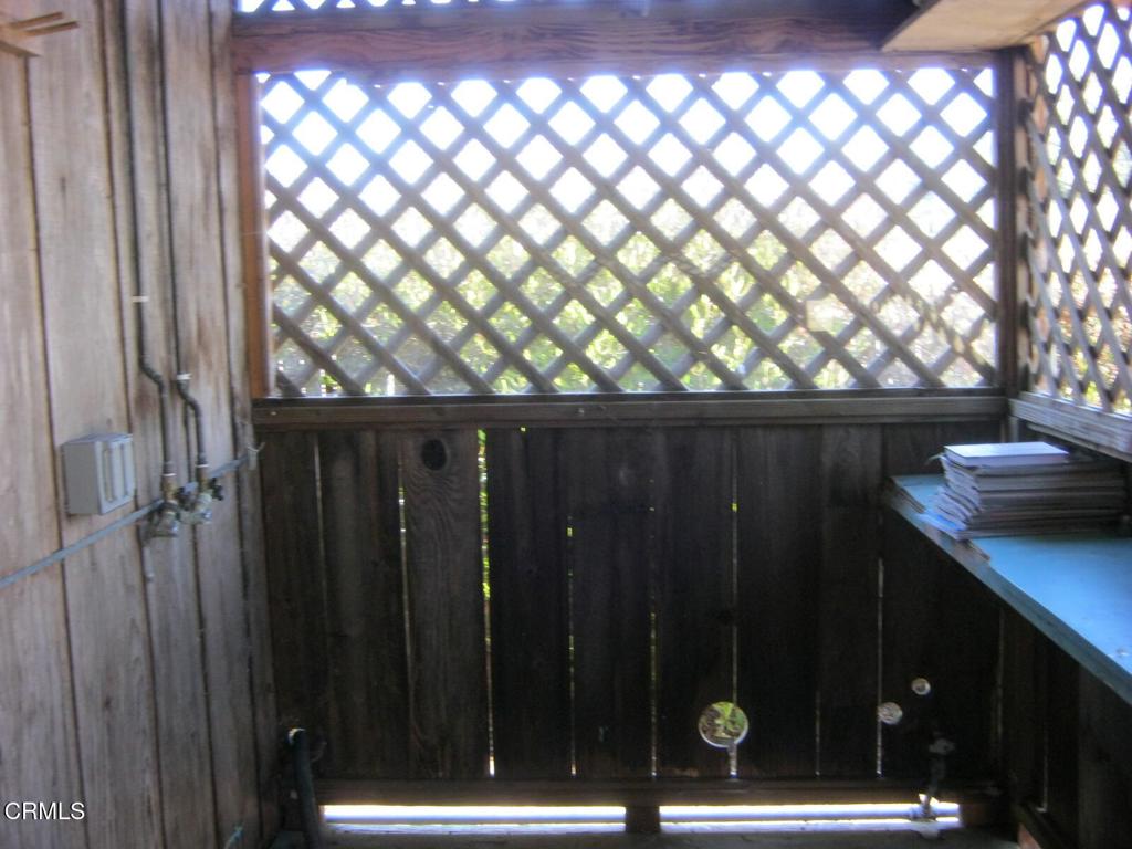 30520 Pudding Creek Road Fort Bragg, CA 95437 - Photo 4 of 24 a bathroom with a shower curtain and sink