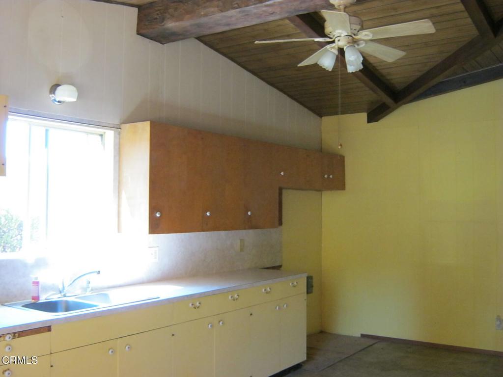 30520 Pudding Creek Road Fort Bragg, CA 95437 - Photo 9 of 24 a room with a sink and chandelier