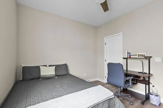 a workspace with furniture and a window