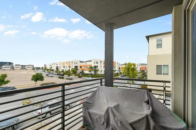 a view of a balcony with city view