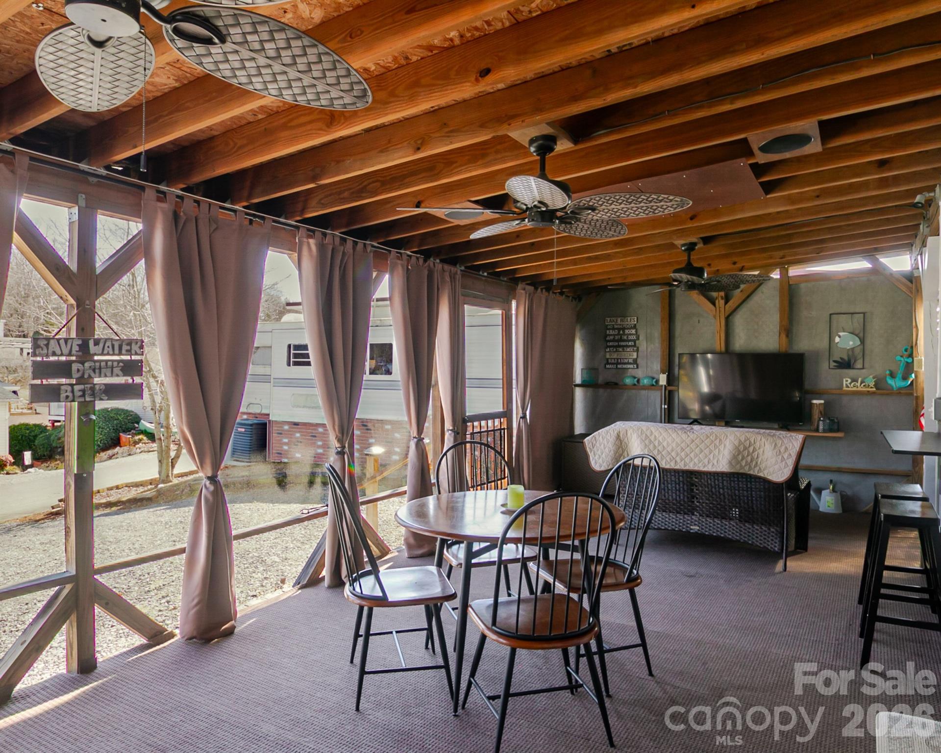 166 Badin Lake Road, Unit 757 New London, NC 28127 - Photo 11 of 45 a view of an outdoor space with seating
