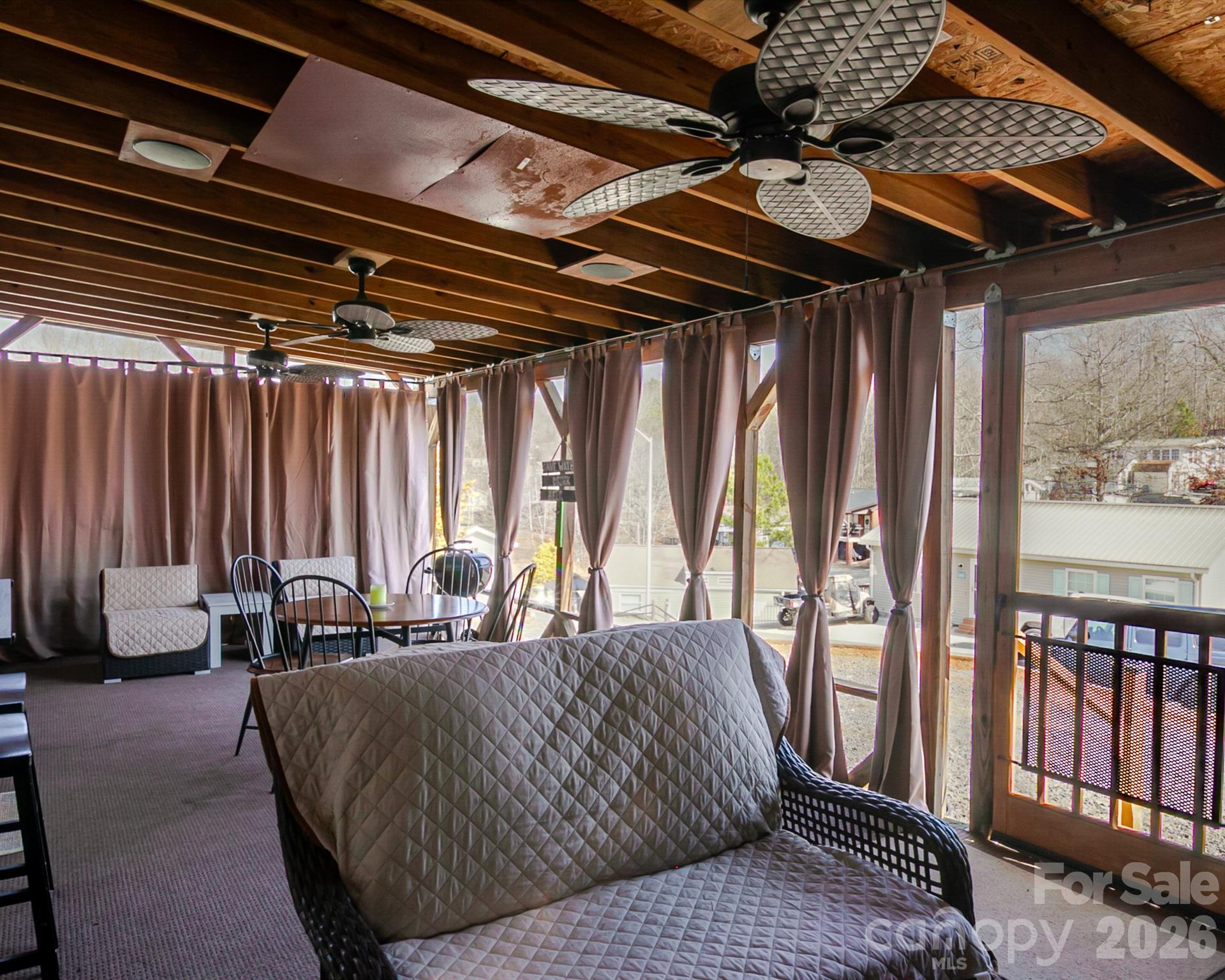 166 Badin Lake Road, Unit 757 New London, NC 28127 - Photo 12 of 45 a living room with furniture and a bathtub