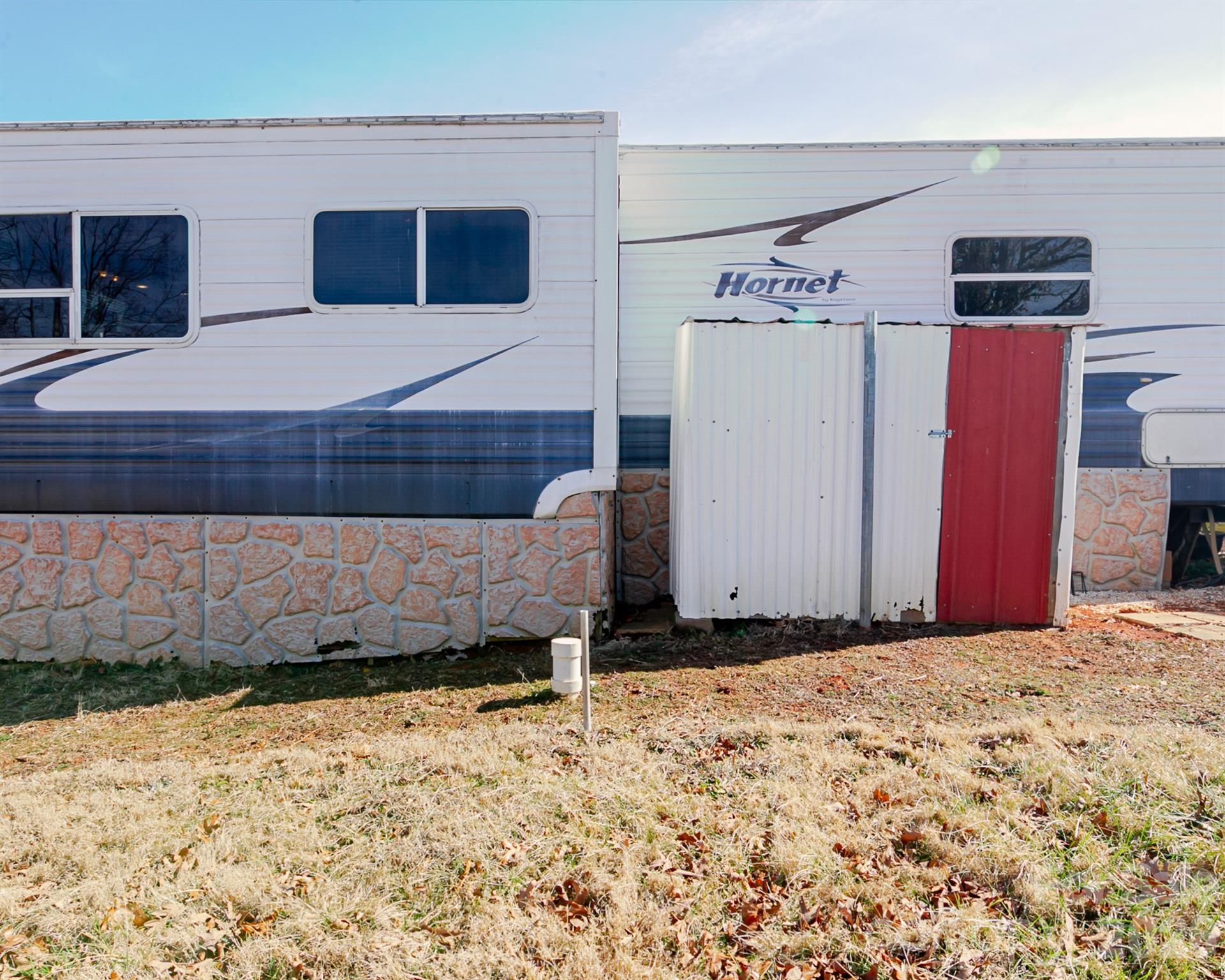 166 Badin Lake Road, Unit 757 New London, NC 28127 - Photo 28 of 45 a view of a backyard of a house