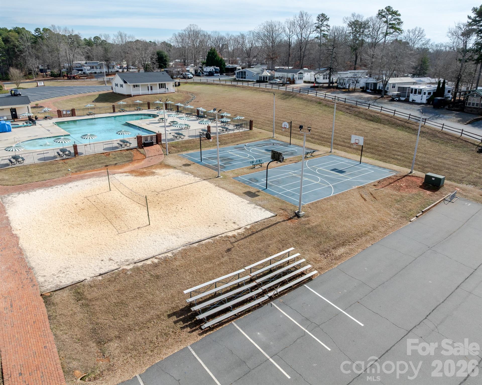 166 Badin Lake Road, Unit 757 New London, NC 28127 - Photo 39 of 45 a view of a swimming pool with a patio