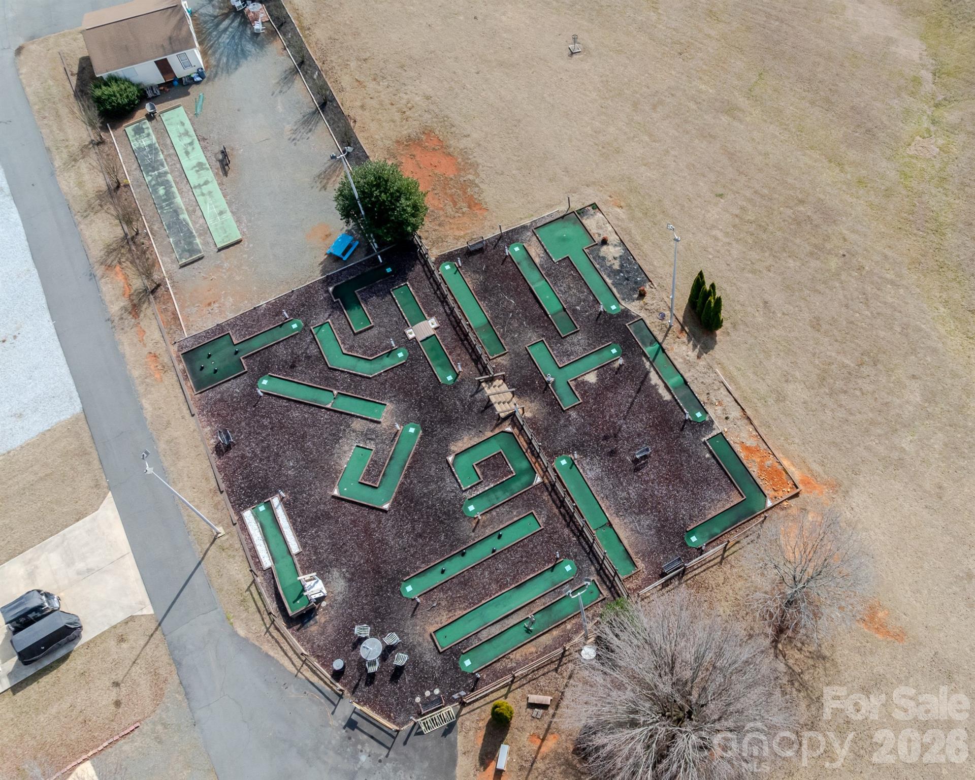 166 Badin Lake Road, Unit 757 New London, NC 28127 - Photo 42 of 45 an aerial view of a fireplace with wooden floor