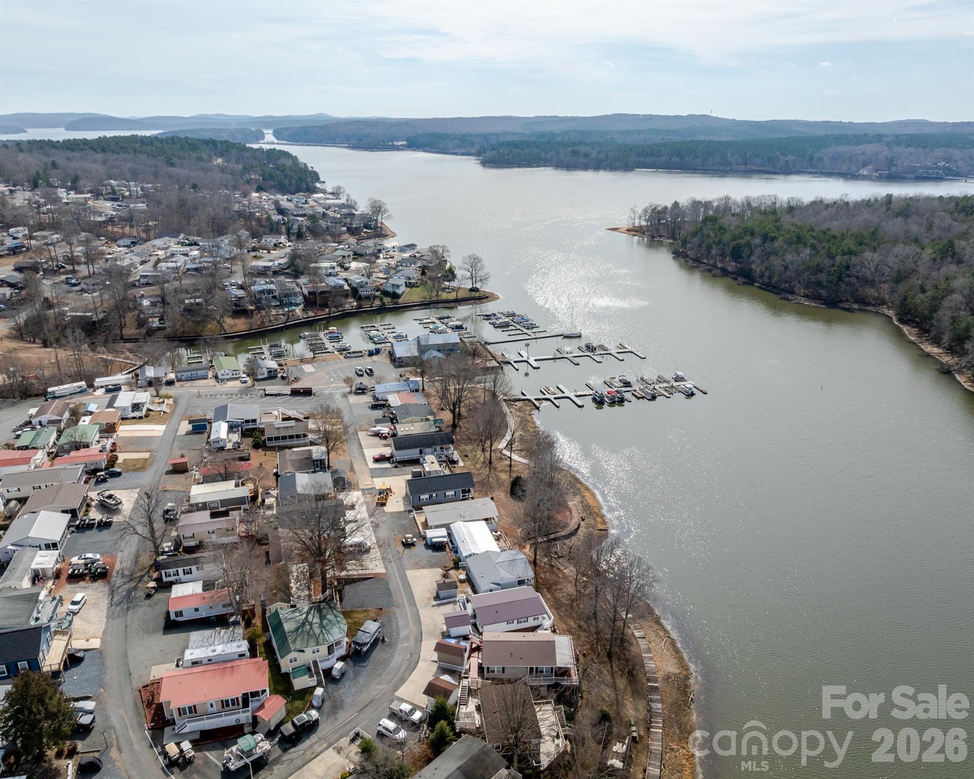 166 Badin Lake Road, Unit 757 New London, NC 28127 - Photo 43 of 45 an aerial view of a house with a lake view