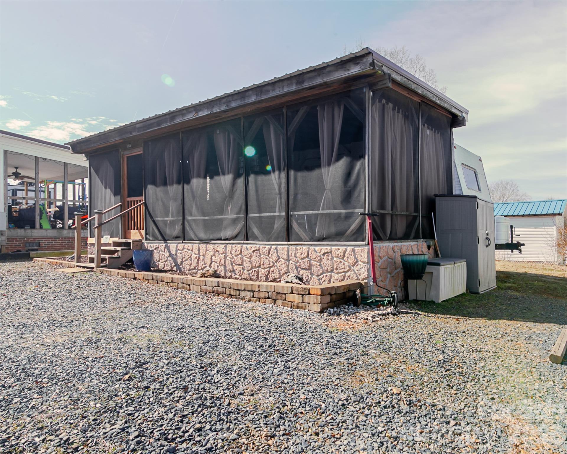 166 Badin Lake Road, Unit 757 New London, NC 28127 - Photo 5 of 45 a view of a backyard